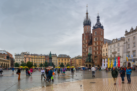 KRAKOW, POLAND - August 6, 2016: Rainy day on the main market square of the Old Town in Krakow. Poland. Europe.のeditorial素材