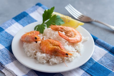 Plate with fried prawns and rice. Seafood.の写真素材