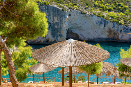 Umbrellas on Porto Limnionas beach. Zakynthos island, Greeceの写真素材