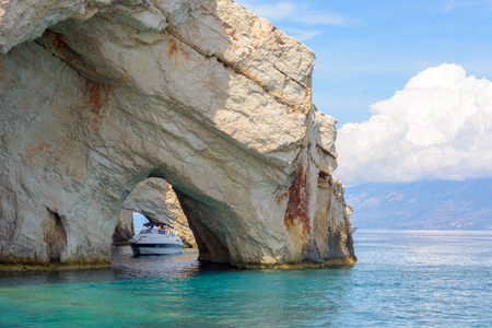 ZAKYNTHOS, GREECE, September 27, 2017: Cruise boat and famous Blue Caves. Zakynthos Island, Greece.のeditorial素材