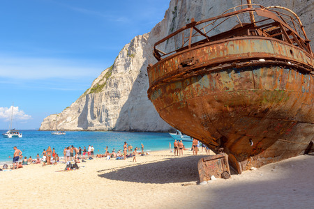ZAKYNTHOS, GREECE, September 27, 2017: Tourists enjoying a summer day on Navagio beach with shipwreck in Greece. Zakynthos island..のeditorial素材