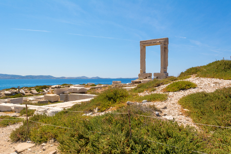 The Portara, one of Naxos most famous landmarks in Naxos (Chora) town. Cyclades Islands, Greece.の写真素材