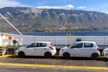 KEFALONIA, GREECE - September 30, 2017: Cars parked on deck of ferry boat. Greeceのeditorial素材