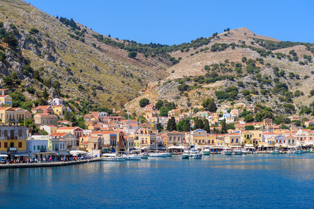 View of bay and beautiful architecture of Symi Island. Greeceのeditorial素材