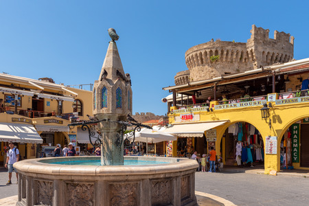 RHODES, GREECE - May 13, 2018: Medieval fountain at Hippokratous Square. Rhodes, Greece.のeditorial素材