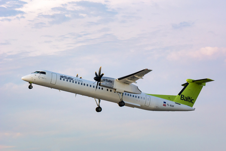 GDANSK, POLAND - August 4, 2018: Passenger airplane of AirBaltic take off from Lech Walesa Airport in Gdansk.のeditorial素材