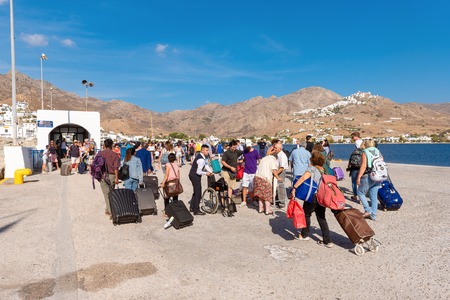 SERIFOS, GREECE - September 8, 2018: Tourists disembark from ferry ship in Serifos island. Cycladesのeditorial素材