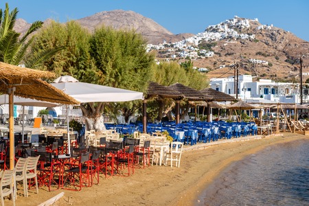 Typical Greek taverns on beach in Livadi town. Serifos island, Greeceの写真素材