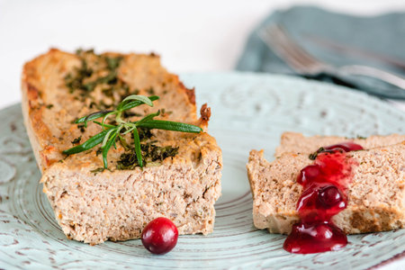 Chicken and liver pate with cranberry sauce, served on plate.の写真素材