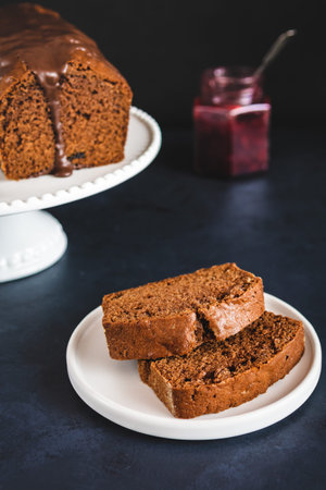 Homemade gingerbread cake on white plate. Honey cake.