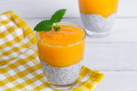 Chia seeds pudding with mango puree. Healthy breakfast. Sweet healthy dessert.の写真素材