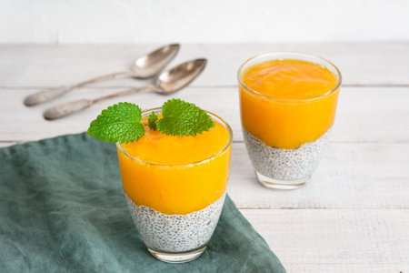 Chia seeds pudding with mango puree. Healthy breakfast. Sweet healthy dessert.の写真素材