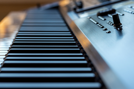 Midi keyboard synthesizer piano keys closeup for electronic music productionの写真素材