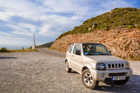 CRETE, GREECE - May 2, 2015: Suzuki Jimny car parked on road at west coast of Crete. Greeceのeditorial素材