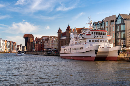 GDANSK, POLAND - June 22, 2019: Summer scenery of Motlawa river and Old Town of Gdansk, Poland,...