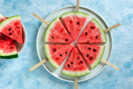 Fruit ice cream sliced watermelon on pastel blue background.の写真素材