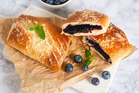 Traditional polish yeast cake with blueberries (jagodzianka).の写真素材