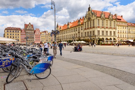 WROCLAW, POLAND - July 17, 2019: Bikes to take a trip on the Market Square in Wroclawのeditorial素材