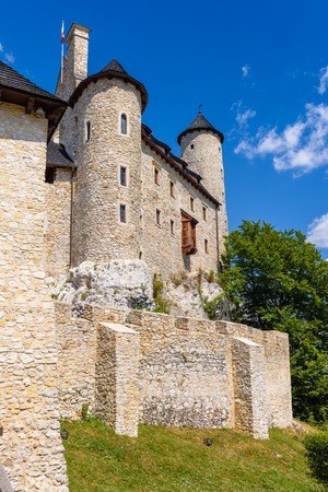 BOBOLICE, POLAND - July 18, 2019: The royal Castle Bobolice, one of the most beautiful fortresses on the Eagles Nests trail in Poland.のeditorial素材