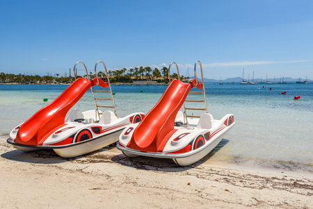 Water bikes at the Playa de Alcudia beach in northern Mallorca, Spain