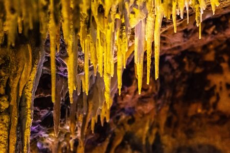 Formations of stalactites and stalagmites in a caveの写真素材