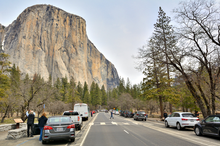 Yosemite National Park, USA - April 1, 2019: Parked cars at Yosemite Valley, with a El Capitan big rock in the backgroundのeditorial素材