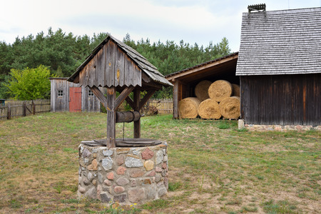 Water well in the Folk Culture Museum in Osiek by the river Notec, the open-air museum presents polish folk culture. Poland, Europeのeditorial素材