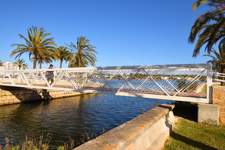 Mallorca, Spain - May 11, 2019: Footbridge over a canal in the city of Alcudia on Mallorcaのeditorial素材