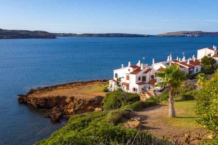 Menorca island in Spain - beautiful landscape with summer villas on the seafrontの写真素材