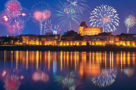 New year celebrate fireworks over Old Town of Torun. Poland, Europe