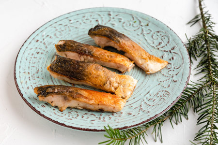 Fried carp fish slices. Traditional Polish Christmas eve dish.の写真素材