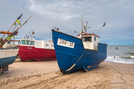 Jaroslawiec, Poland - October 31, 2016: Fishing boats on the beach of the Baltic Sea. Jaroslawiec, Polandのeditorial素材
