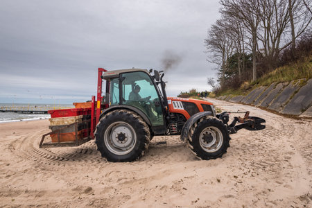 Jaroslawiec, Poland - October 31, 2016: A tractor on the beach used by fishermen after half a fishのeditorial素材