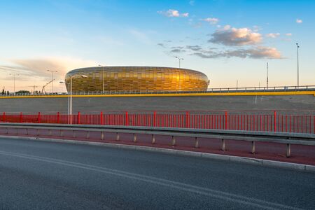 Gdansk, Poland - July 3, 2016: Energa Stadium, Baltic Arena or Amber Arena - a football stadium in Gdansk viewed from the road.のeditorial素材