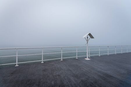 Wooden jetty by the sea on a foggy morning. Baltic Sea Gdynia, Polandの写真素材