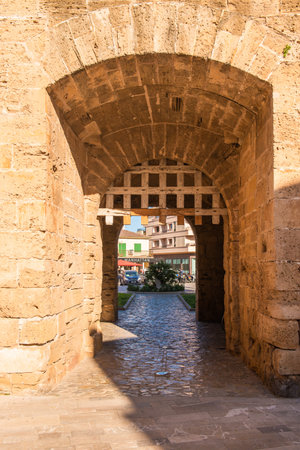 Mallorca, Spain - May 10,2019: Porta des Moll gate in Alcudia Old Town, Balearic islandsのeditorial素材