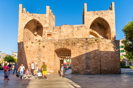 Mallorca, Spain - May 10,2019: Porta des Moll gate in Alcudia Old Town, Balearic islandsのeditorial素材