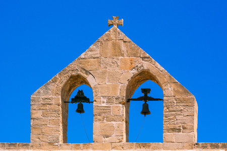 Mallorca, Spain - May 10, 2019: Bell of Capdepera Castle, fortress from the 14th century, located on...
