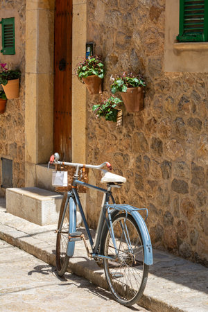 Bike on street in old town of Valldemossa on Mallorca island, Spain