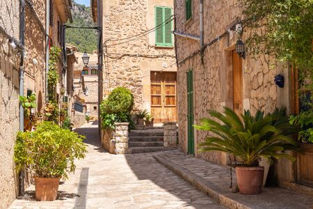 Mallorca, Spain - May 7, 2019: Historic architecture of the city of Valldemossa, a popular tourist destination in Majorca.の写真素材