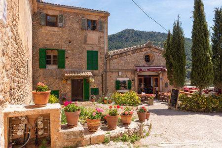 Mallorca, Spain - May 7, 2019: Historic architecture of the city of Valldemossa, a popular tourist...