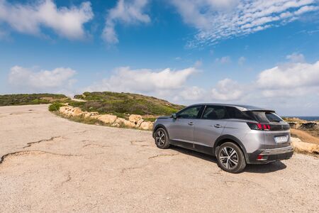 Menorca, Spain - October 13, 2019: Peugeot 3008 SUV car parked on the coast of Menorca island.のeditorial素材