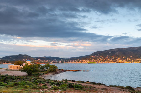 Sea bay of the island of Paros in the evening. Cyclades. Greece