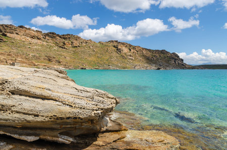 Rocky coast of Paros island in Monastiri bay. Cyclades, Greece