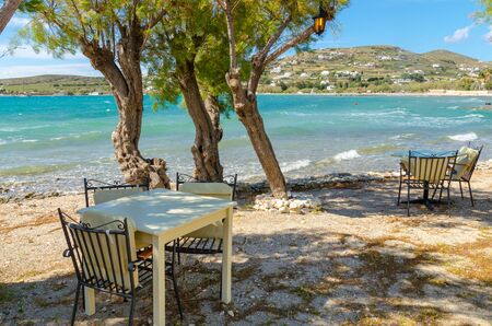 Romantic tavern on the sea coast in Paros island, Cyclades, Greece. Europe.の写真素材