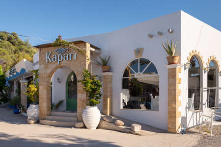 Rhodes, Greece - May 13, 2018: Fish restaurant on the Kolybmia beach in Rhodes islandのeditorial素材