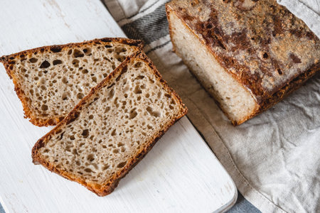 Baked homemade artisan sourdough rye flour bread.