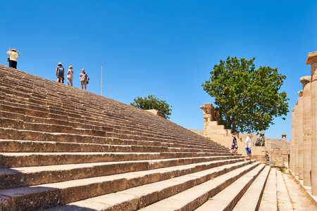 RHODES, GREECE - May 14, 2018: Ancient stairs in the Acropolis of Lindos town in Rhodes