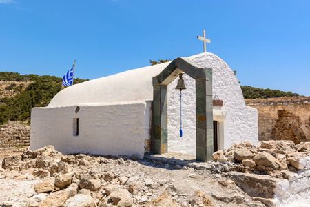 White chapel with bell tower on the hill of Monolithos  on Rhodes island. Greeceの写真素材