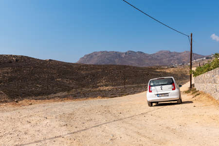 Serifos, Greece - Sptember 9, 2018: Skoda Citigo on a gravel road on Greek island of Serifosのeditorial素材
